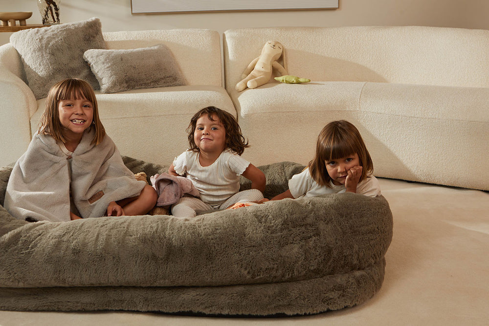 UnHide - Floof Human Dog Bed Learn More About Our Mission